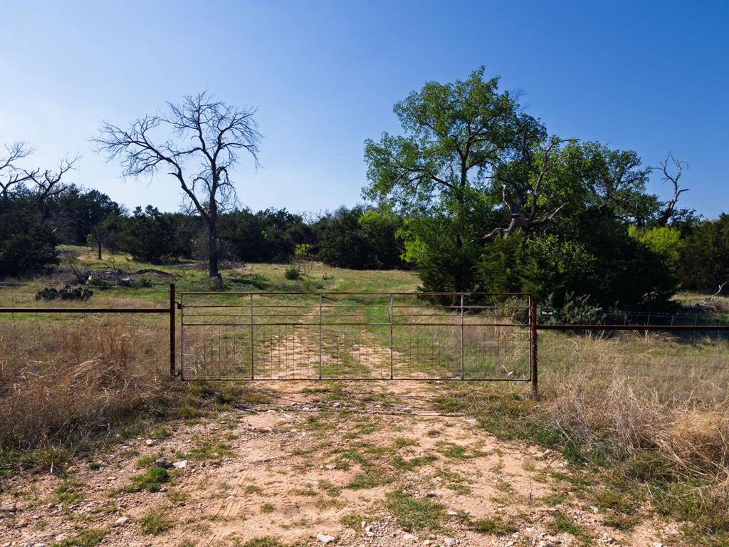 402 County Road 402 Goldthwaite, TX 76844 - Photo 25 of 40 a view of a street with a yard