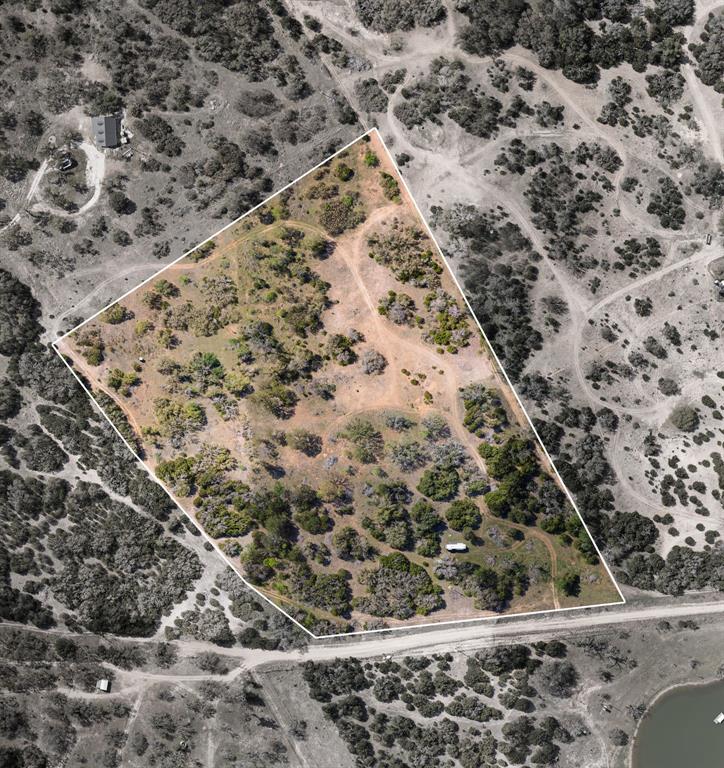 402 County Road 402 Goldthwaite, TX 76844 - Photo 27 of 40 a view of a yard of a building
