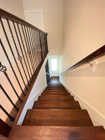 a view of a room with an empty walk in closet