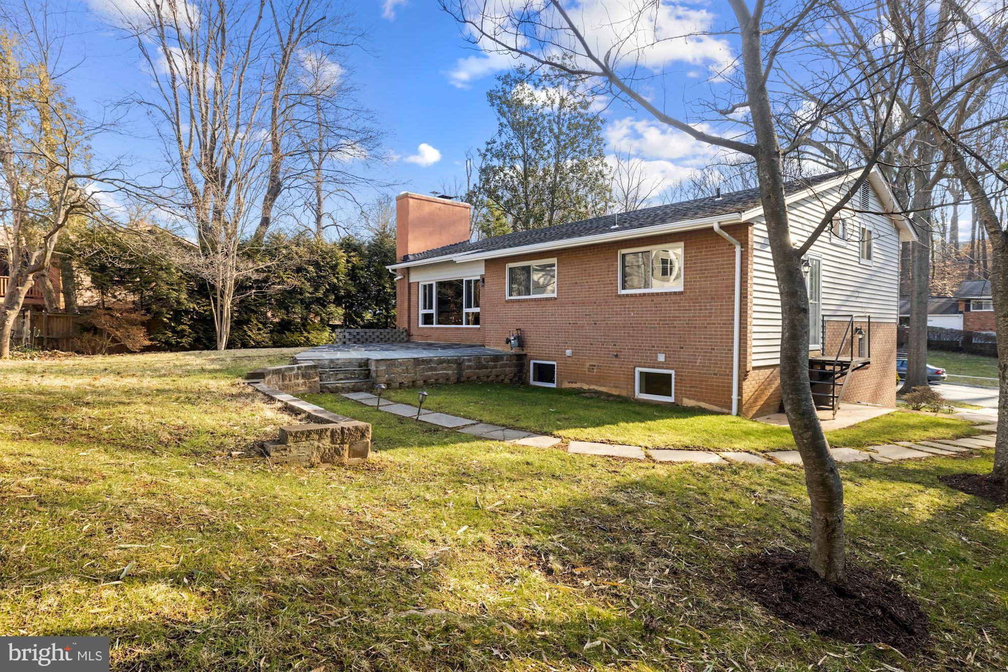 7716 Beech Tree Road Bethesda, MD 20817 - Photo 49 of 49 a view of a house with swimming pool
