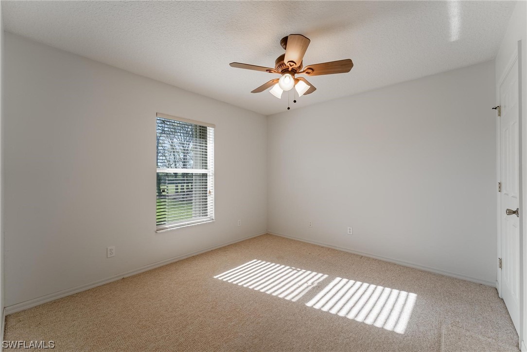 1140 Sealey Road Moore Haven, FL 33471 - Photo 17 of 29 a view of an empty room with a window