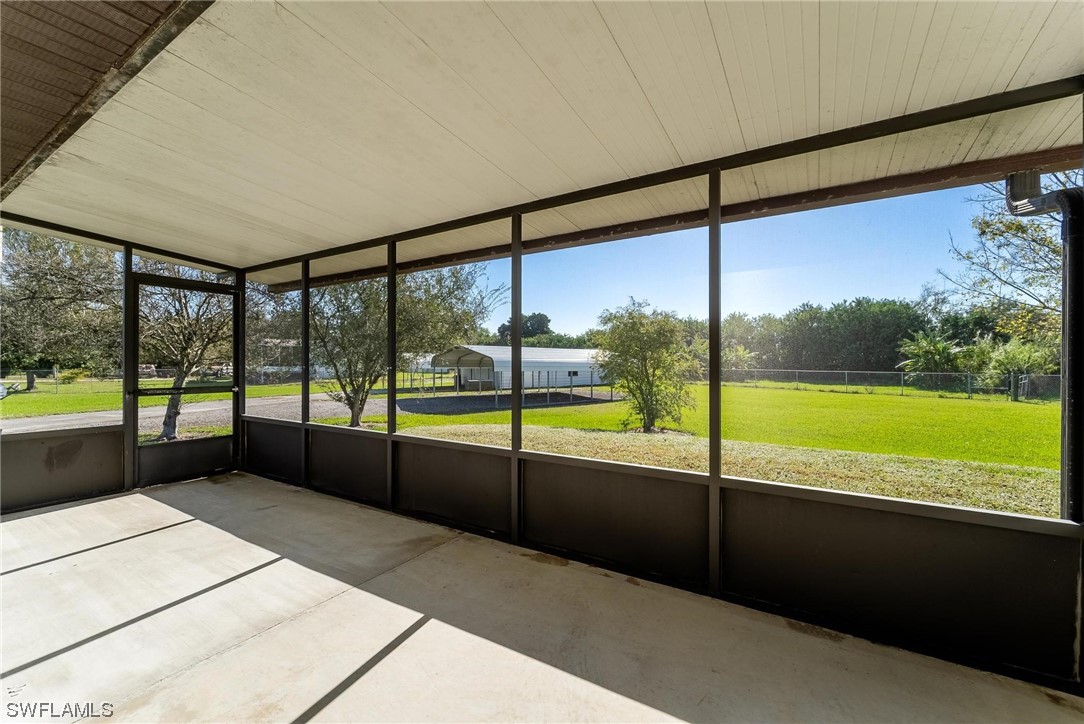 1140 Sealey Road Moore Haven, FL 33471 - Photo 20 of 29 a view of an empty room with a large window