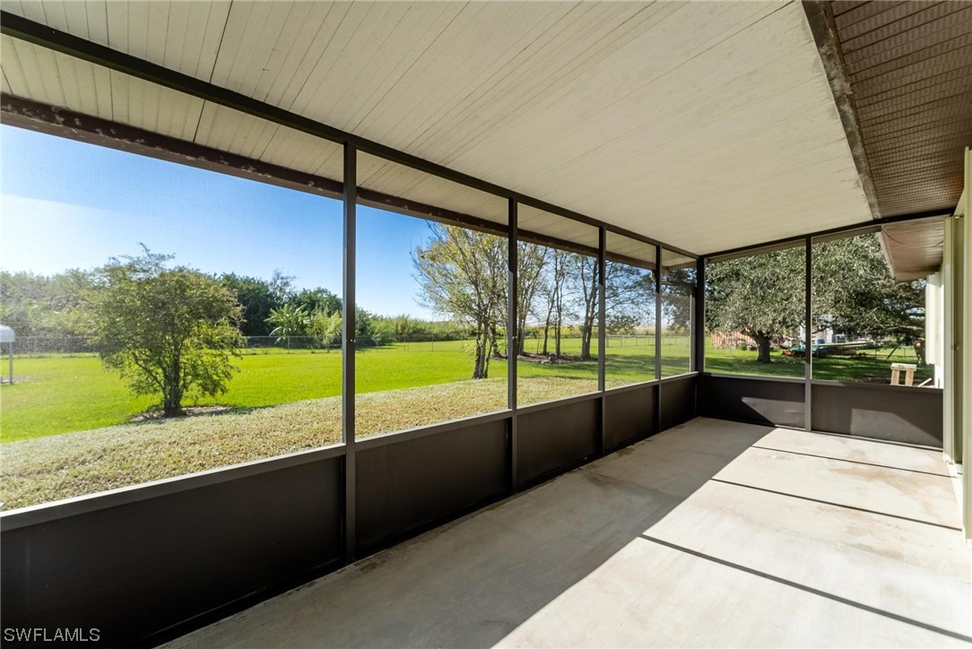 1140 Sealey Road Moore Haven, FL 33471 - Photo 22 of 29 a view of swimming pool with a porch