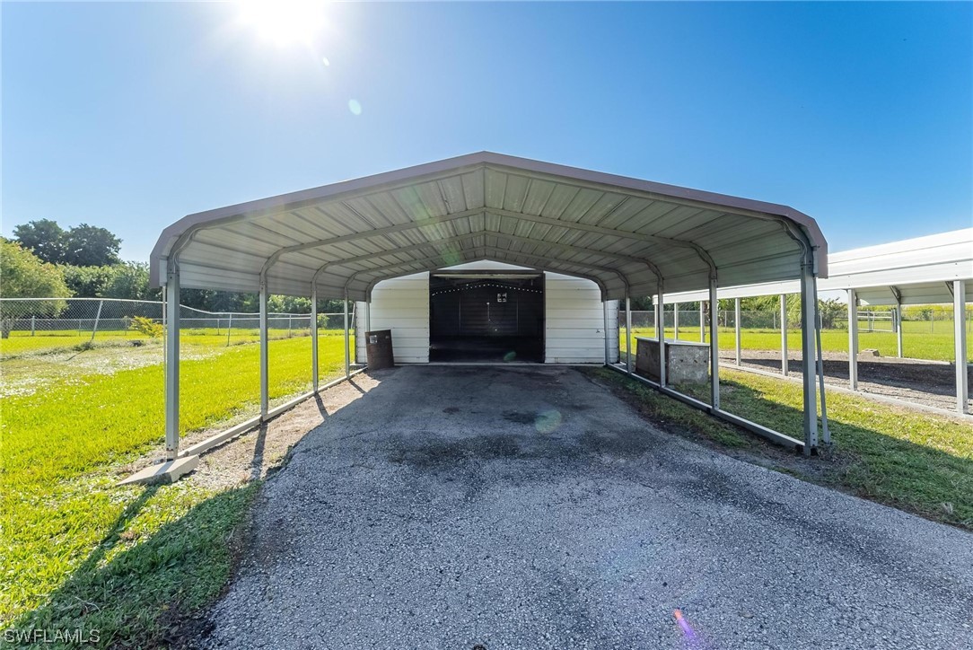 1140 Sealey Road Moore Haven, FL 33471 - Photo 23 of 29 a view of a swimming pool with a backyard