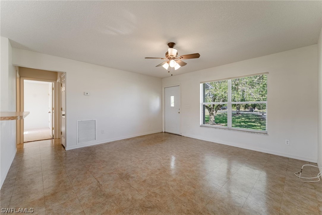 1140 Sealey Road Moore Haven, FL 33471 - Photo 8 of 29 a view of an empty room with a window