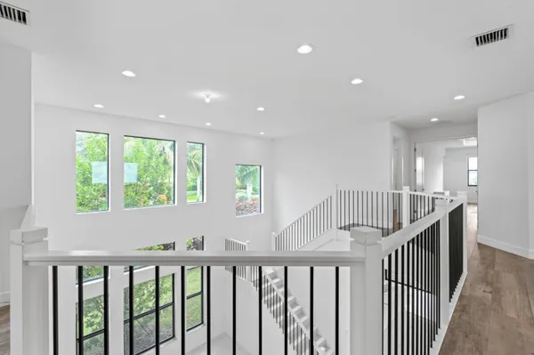a view of a room with racks on the wall