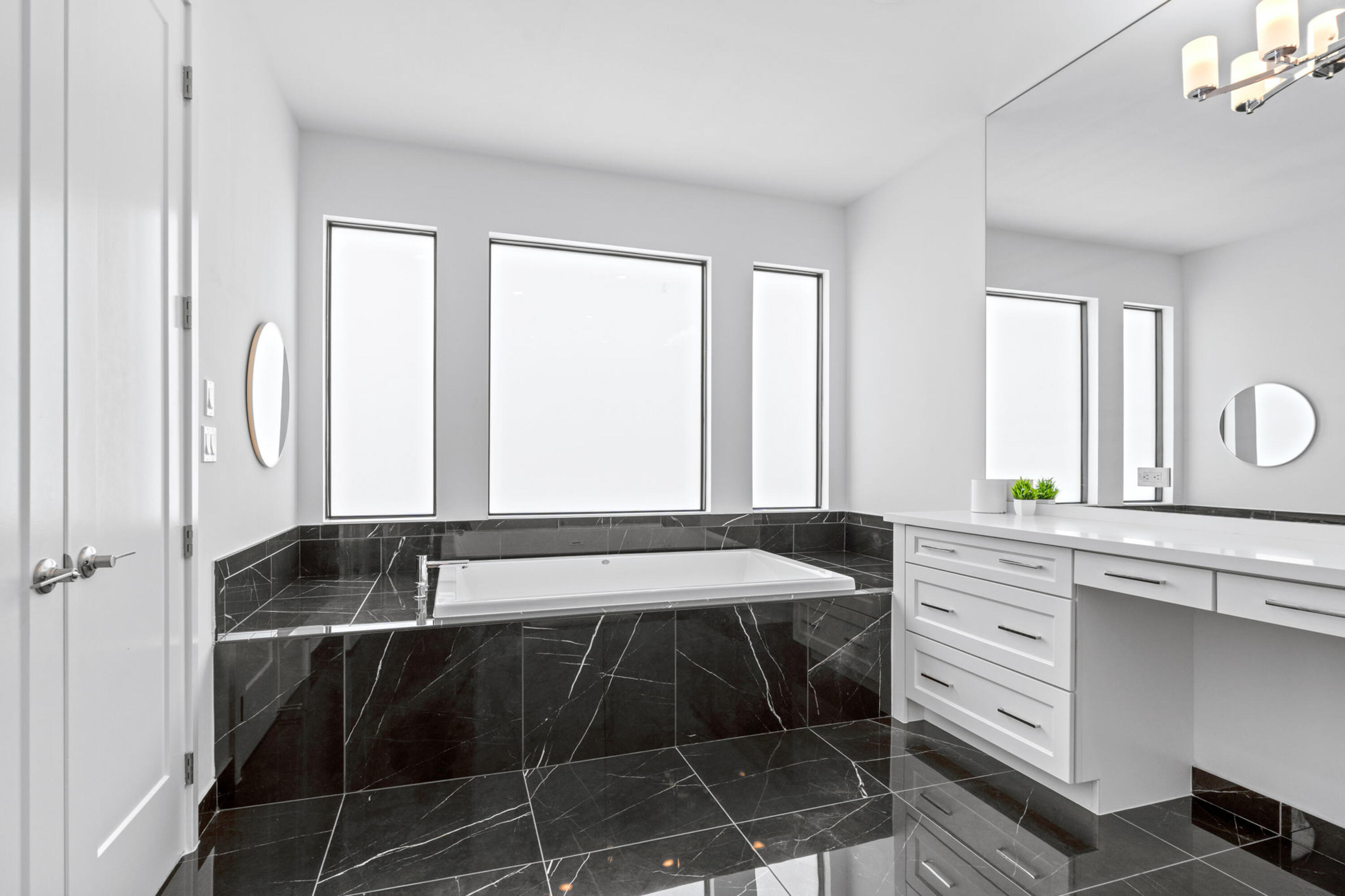 17117 Teton River Road Boca Raton, FL 33496 - Photo 29 of 67 a bathroom with a sink and a bathtub