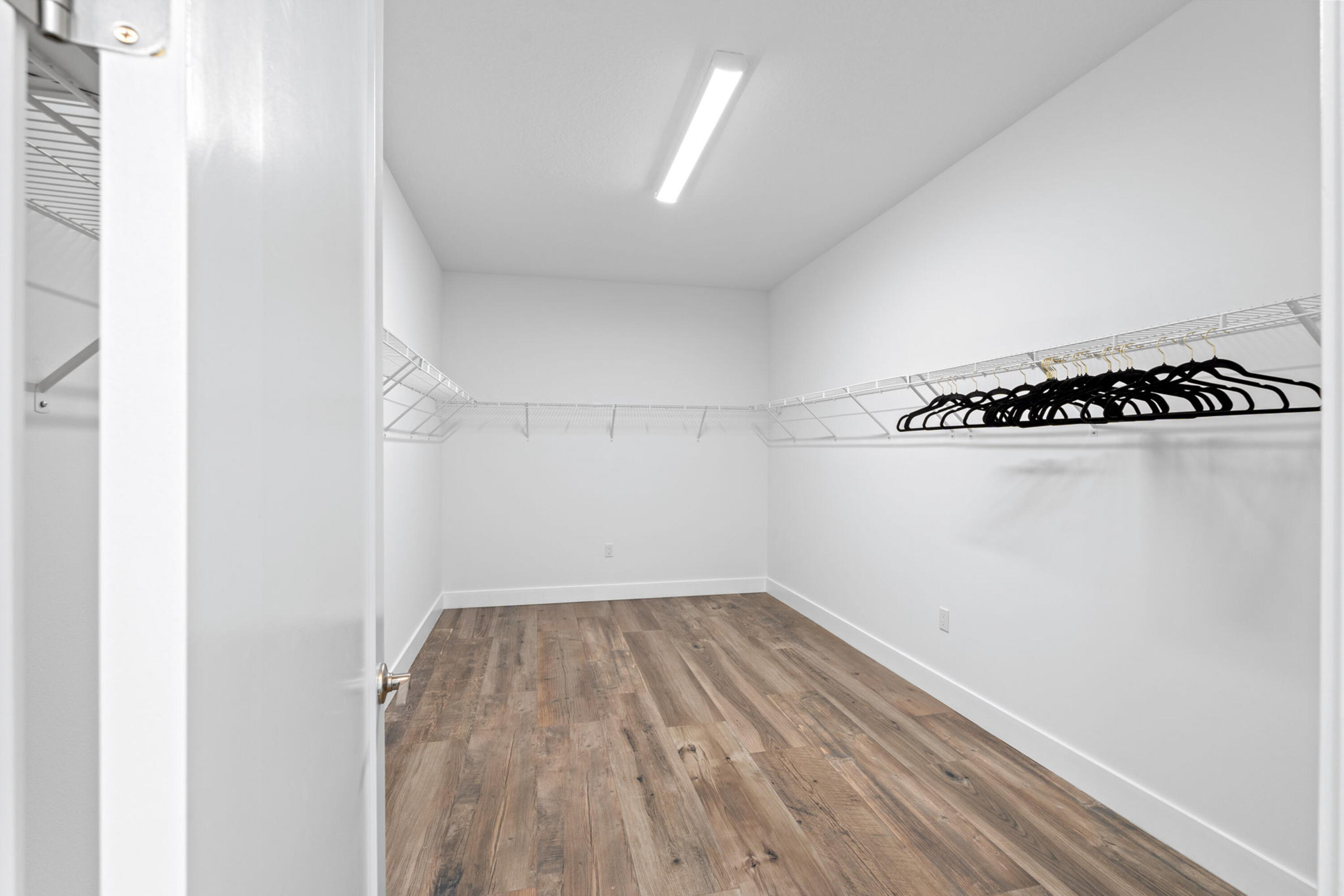 17117 Teton River Road Boca Raton, FL 33496 - Photo 30 of 67 a view of a room with racks on the wall