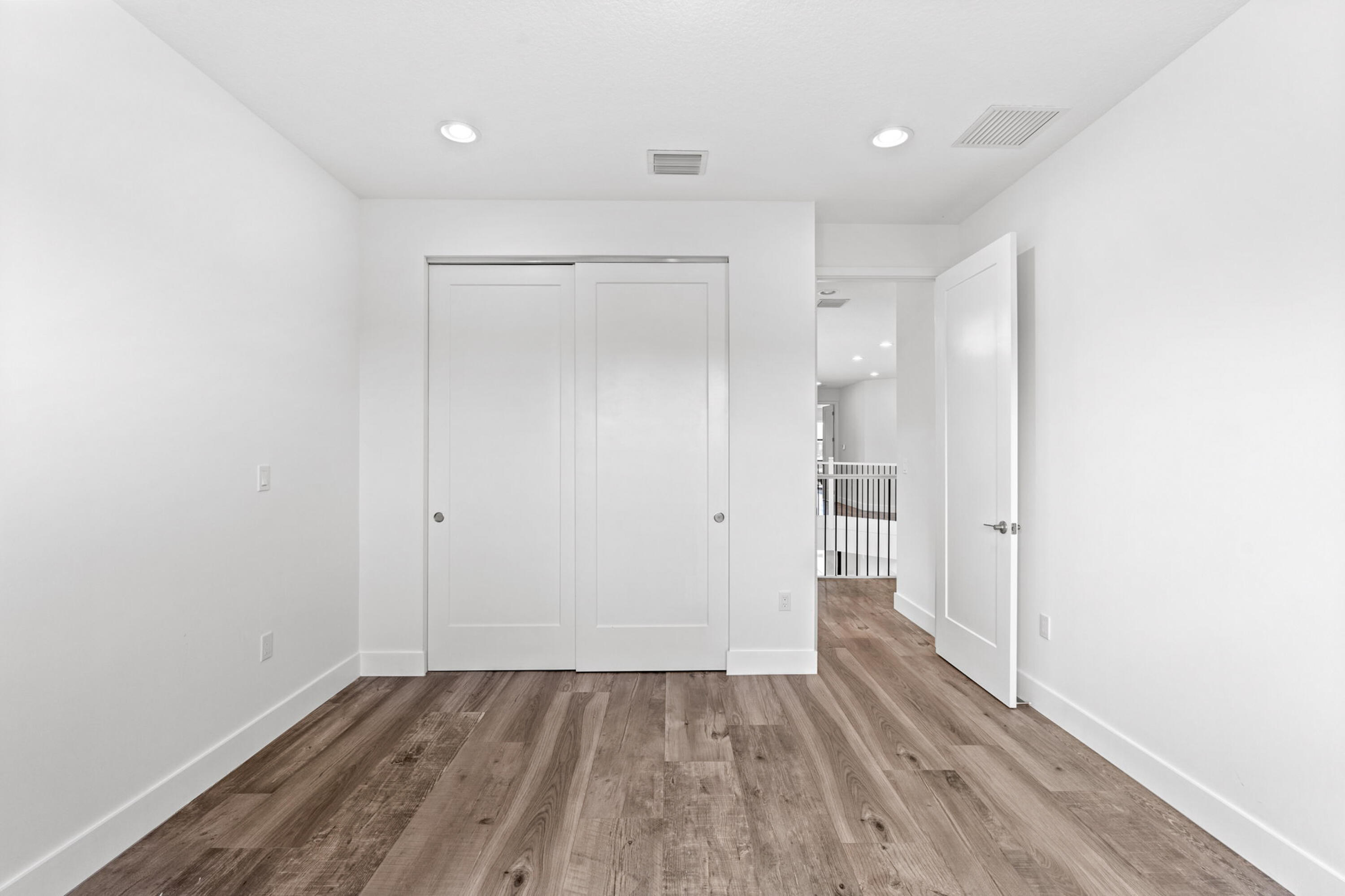 17117 Teton River Road Boca Raton, FL 33496 - Photo 35 of 67 a view of an empty room and wooden floor
