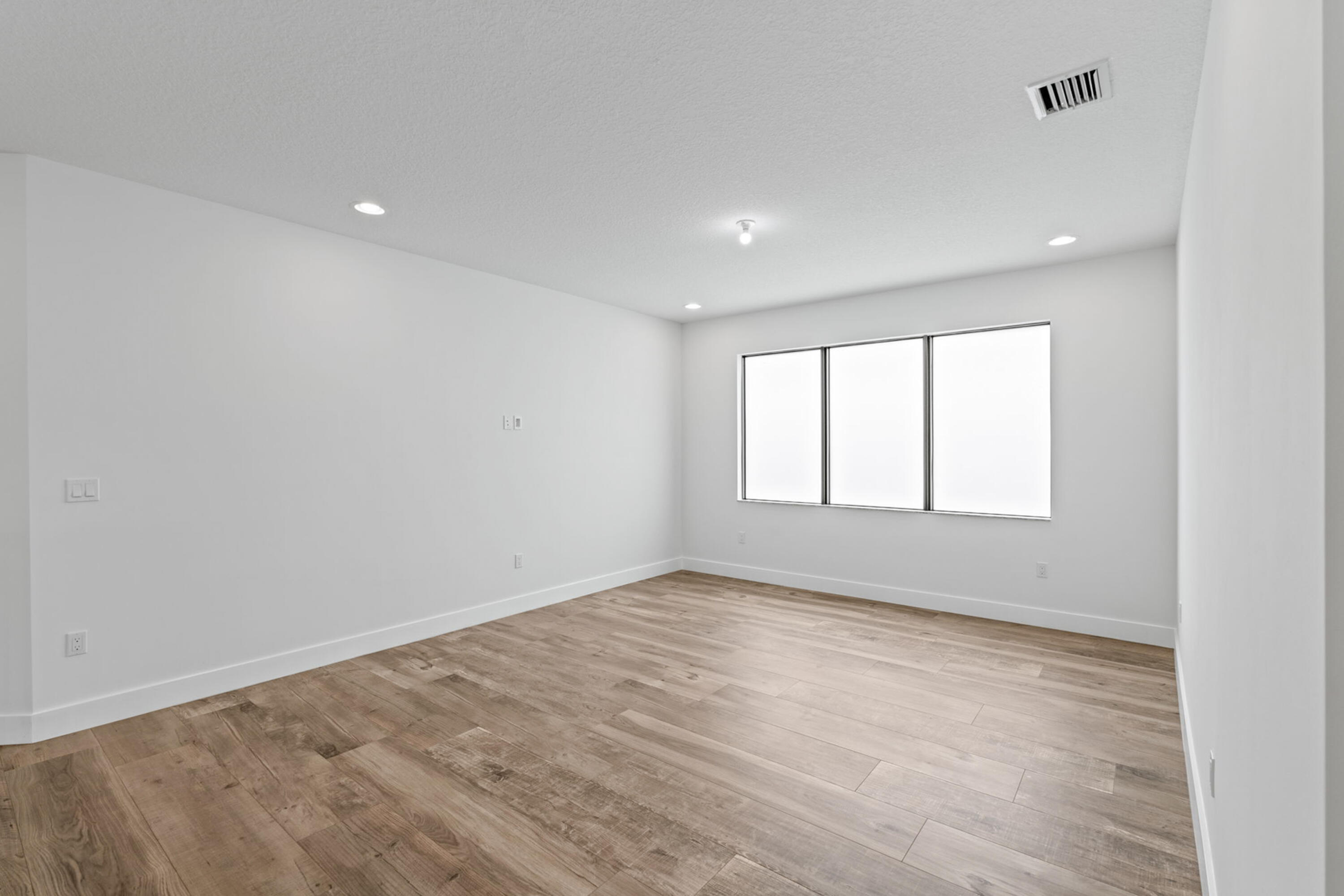17117 Teton River Road Boca Raton, FL 33496 - Photo 36 of 67 wooden floor in an empty room with a window