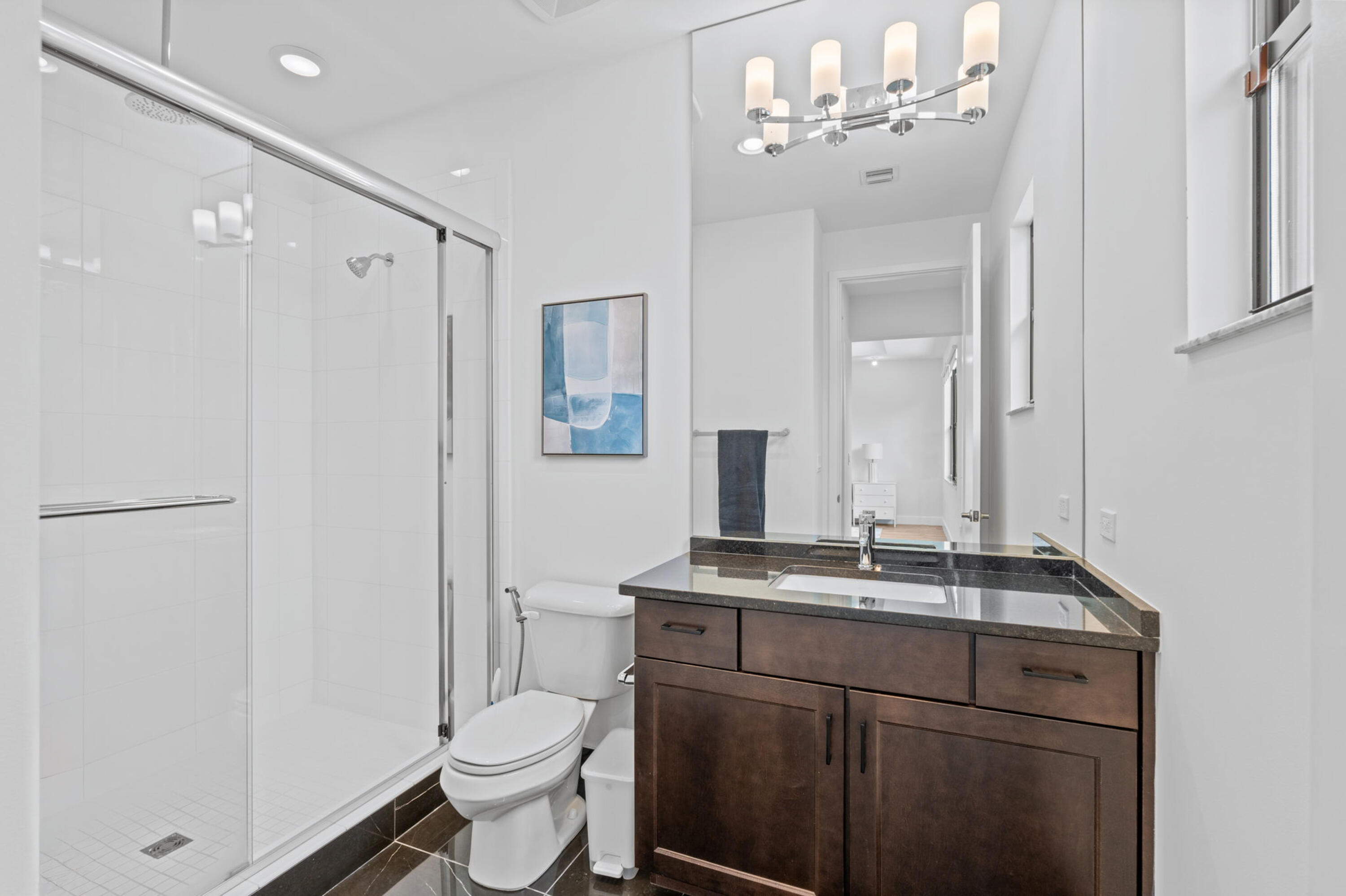 17117 Teton River Road Boca Raton, FL 33496 - Photo 39 of 67 a bathroom with a toilet a sink and a mirror