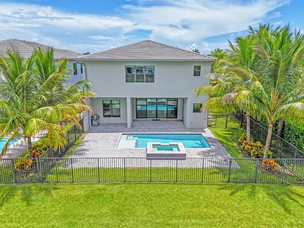 an aerial view of a house with a garden