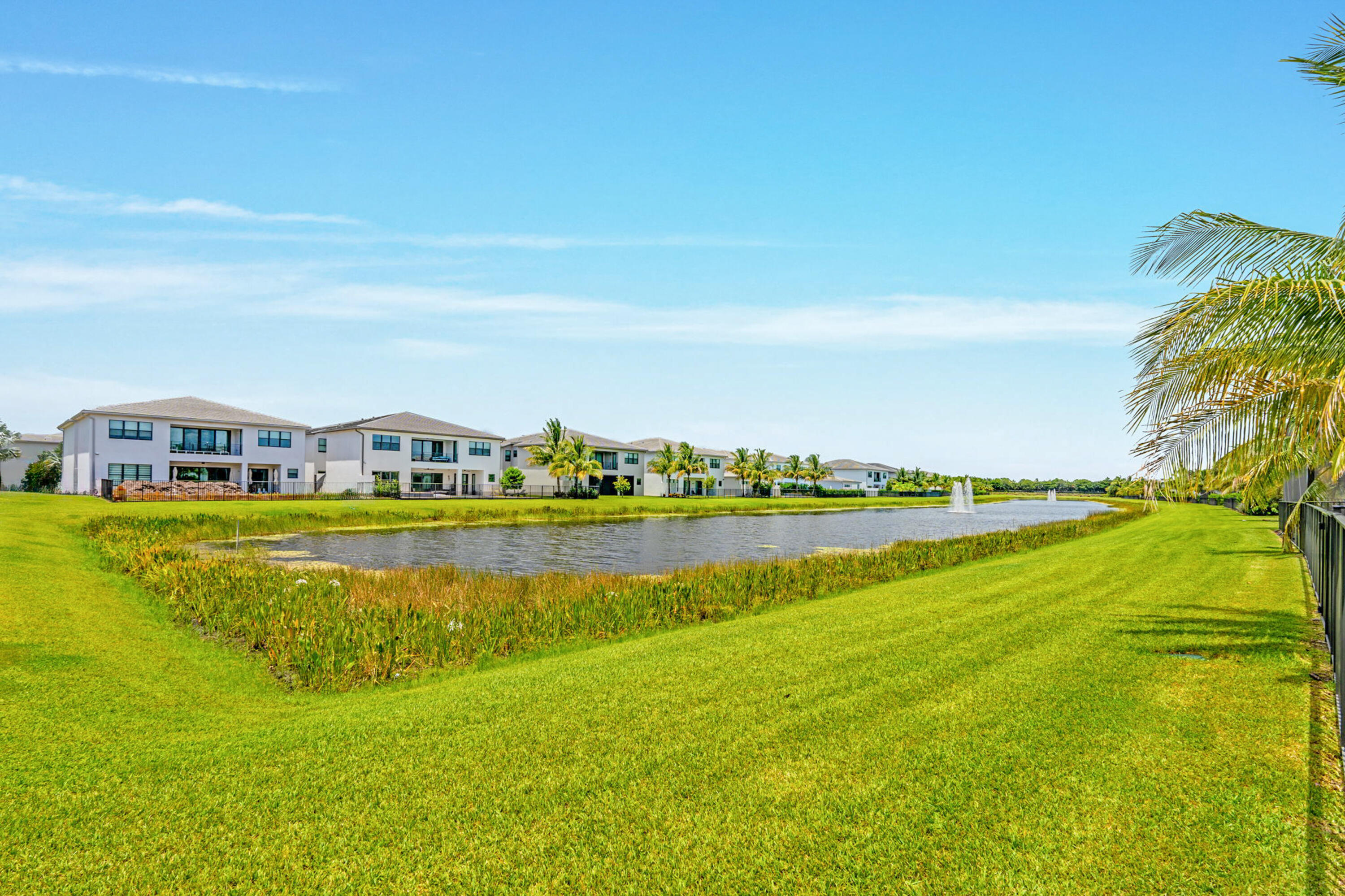 17117 Teton River Road Boca Raton, FL 33496 - Photo 46 of 67 a view of a lake with houses in the back