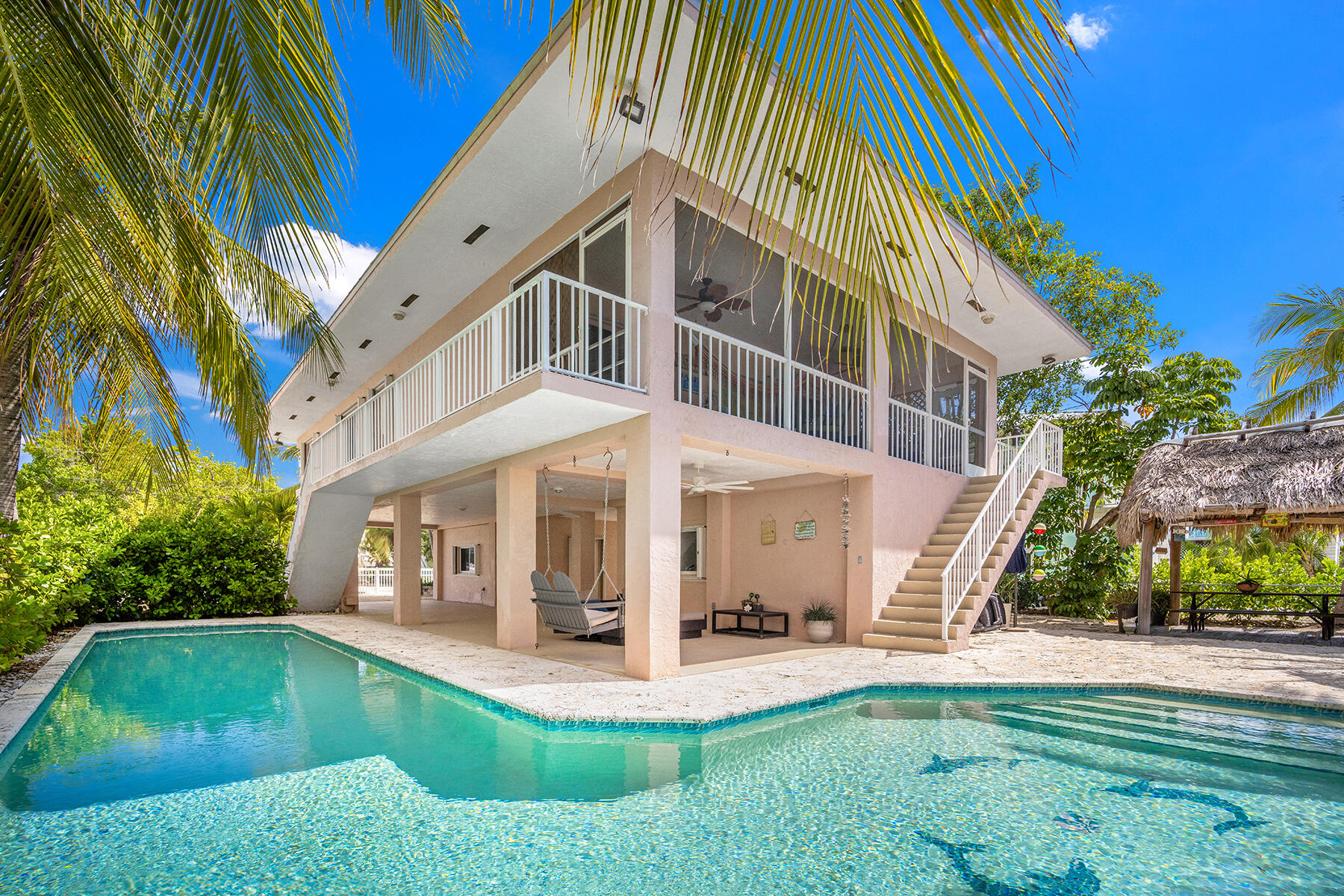 a view of a house with a swimming pool