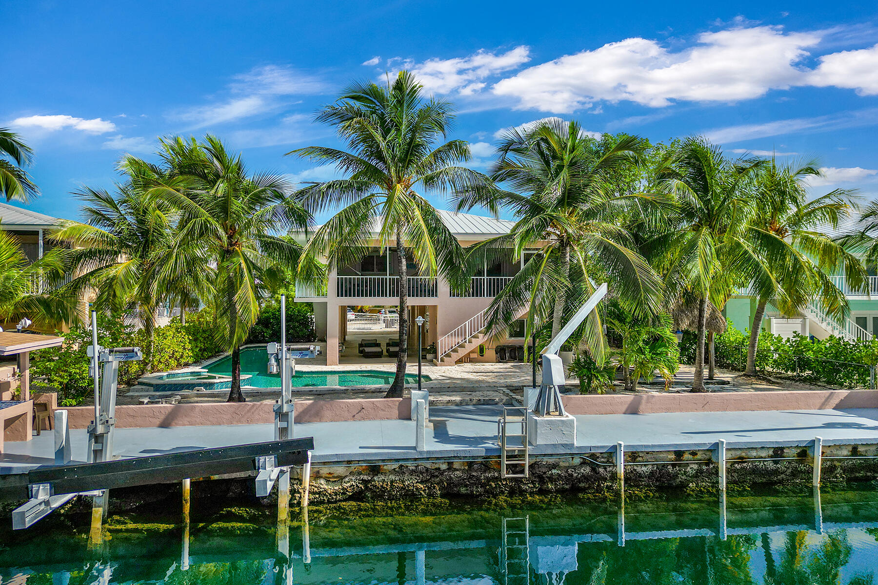 17 Corrine Place Key Largo, FL 33037 - Photo 2 of 3 a house view with a garden and trees