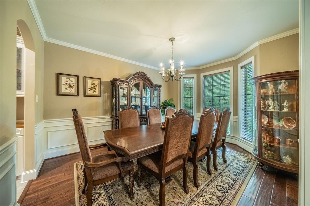 7451 County Road 1509 Athens, TX 75751 - Photo 8 of 36 a view of a dining room with furniture window and wooden floor