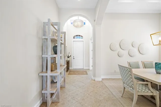 a view of dining room and kitchen with furniture