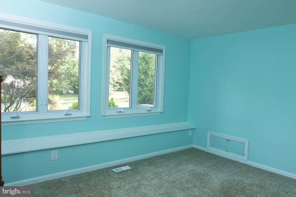 680 Red Cedar Road Annapolis, MD 21409 - Photo 13 of 30 a room with a window and a ceiling fan