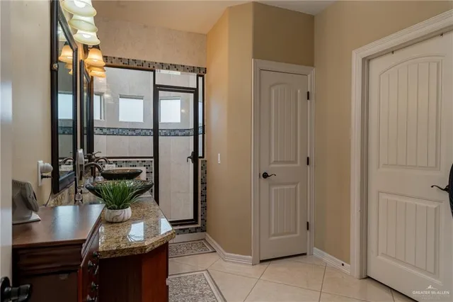 a view of a livingroom with furniture and a potted plant
