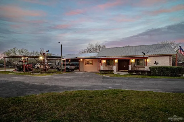 a view of a town with large trees