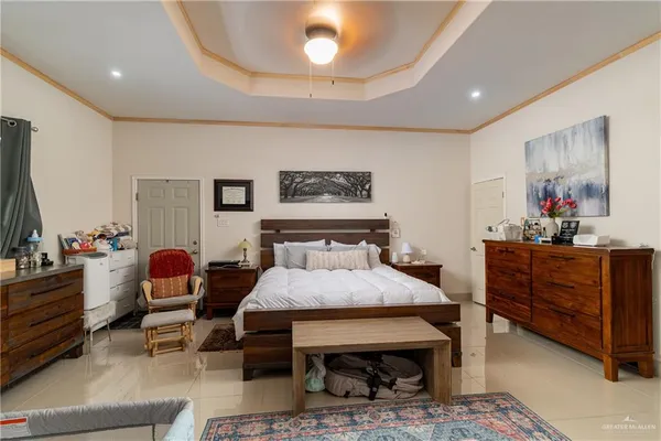a bedroom with furniture and a bed