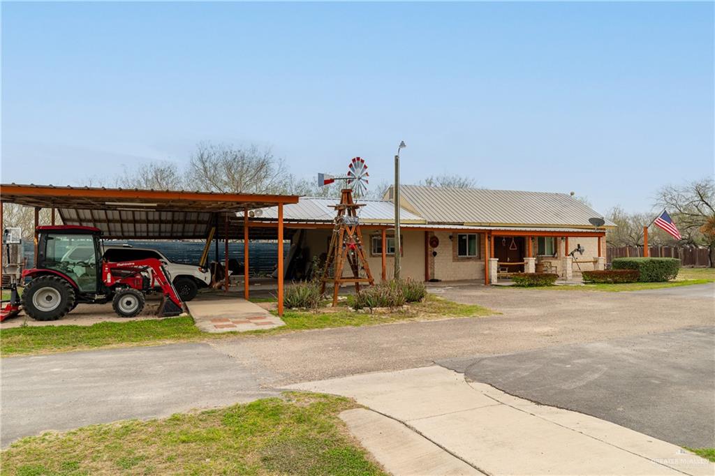 5048 Mile 8 Road Edinburg, TX 78541 - Photo 25 of 33 a view of a car parked in front of a house