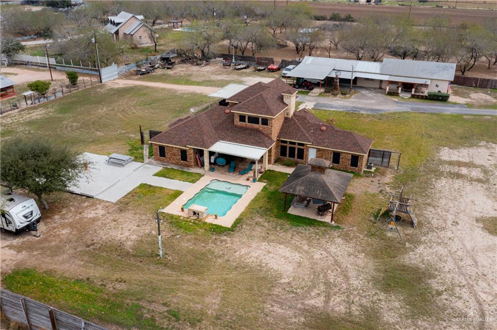 5048 Mile 8 Road Edinburg, TX 78541 - Photo 28 of 33 an aerial view of a swimming pool with outdoor seating