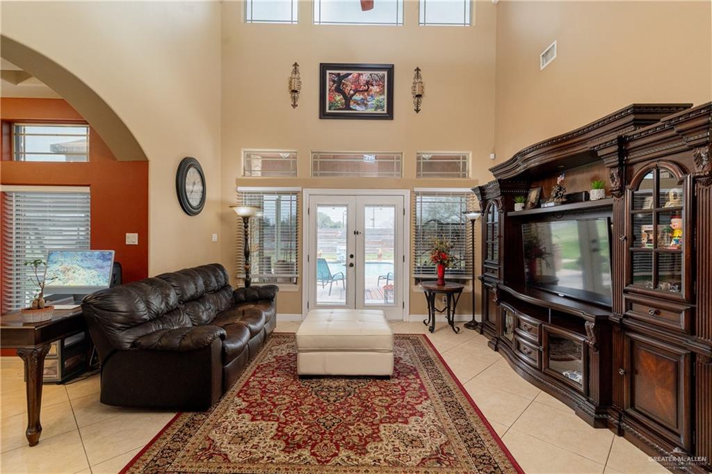 5048 Mile 8 Road Edinburg, TX 78541 - Photo 7 of 33 a living room with furniture and a flat screen tv