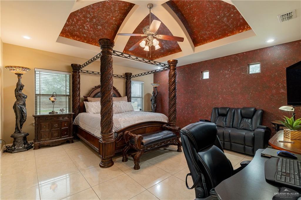 5048 Mile 8 Road Edinburg, TX 78541 - Photo 10 of 33 a bedroom with furniture and a gym equipment