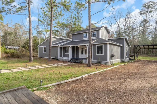 a view of a house with a swimming pool
