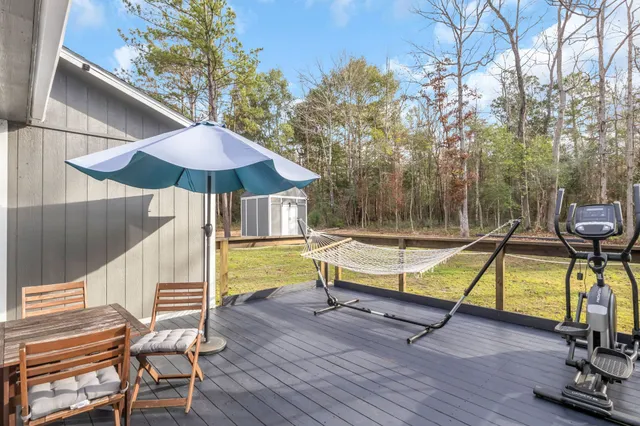 a view of a swimming pool with a lounge chairs