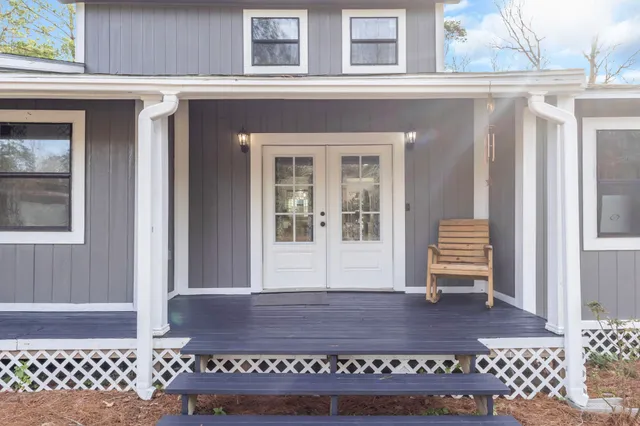 a view of a entryway door front of house