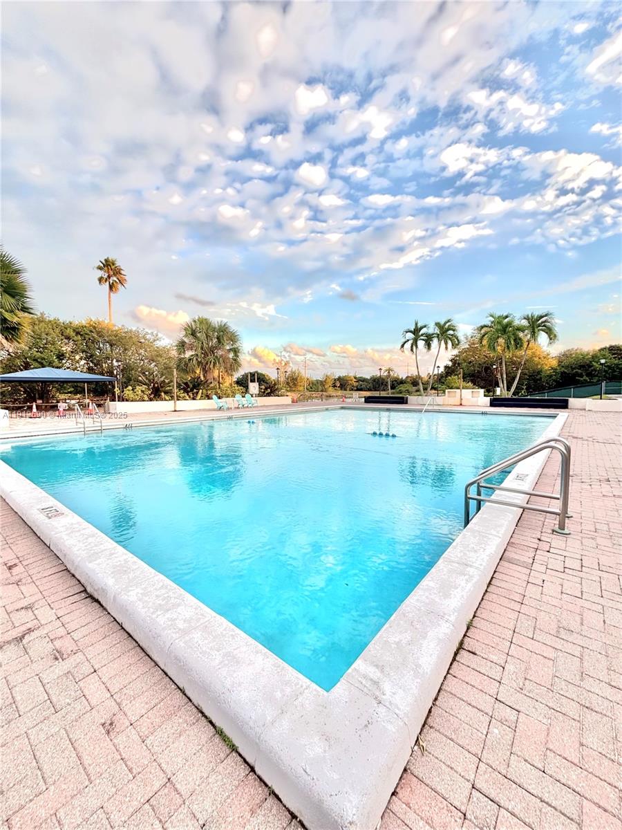 a view of a lake with a yard