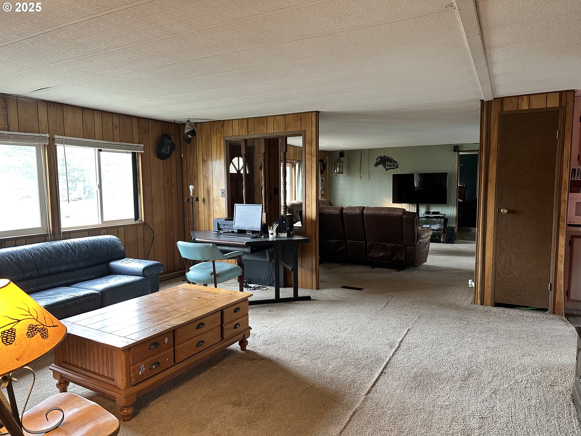 1015 C Street Fossil, OR 97830 - Photo 14 of 33 a living room with furniture and a window