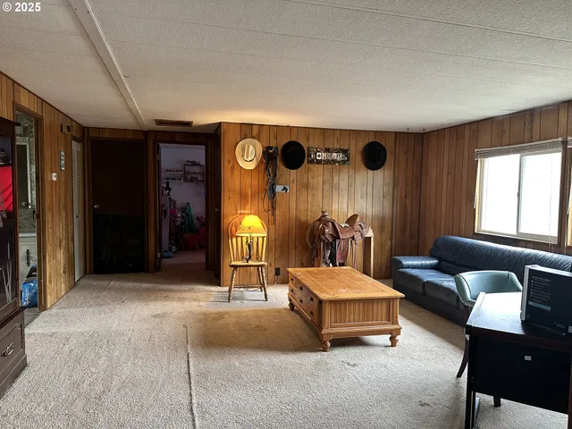 a bedroom with furniture and window