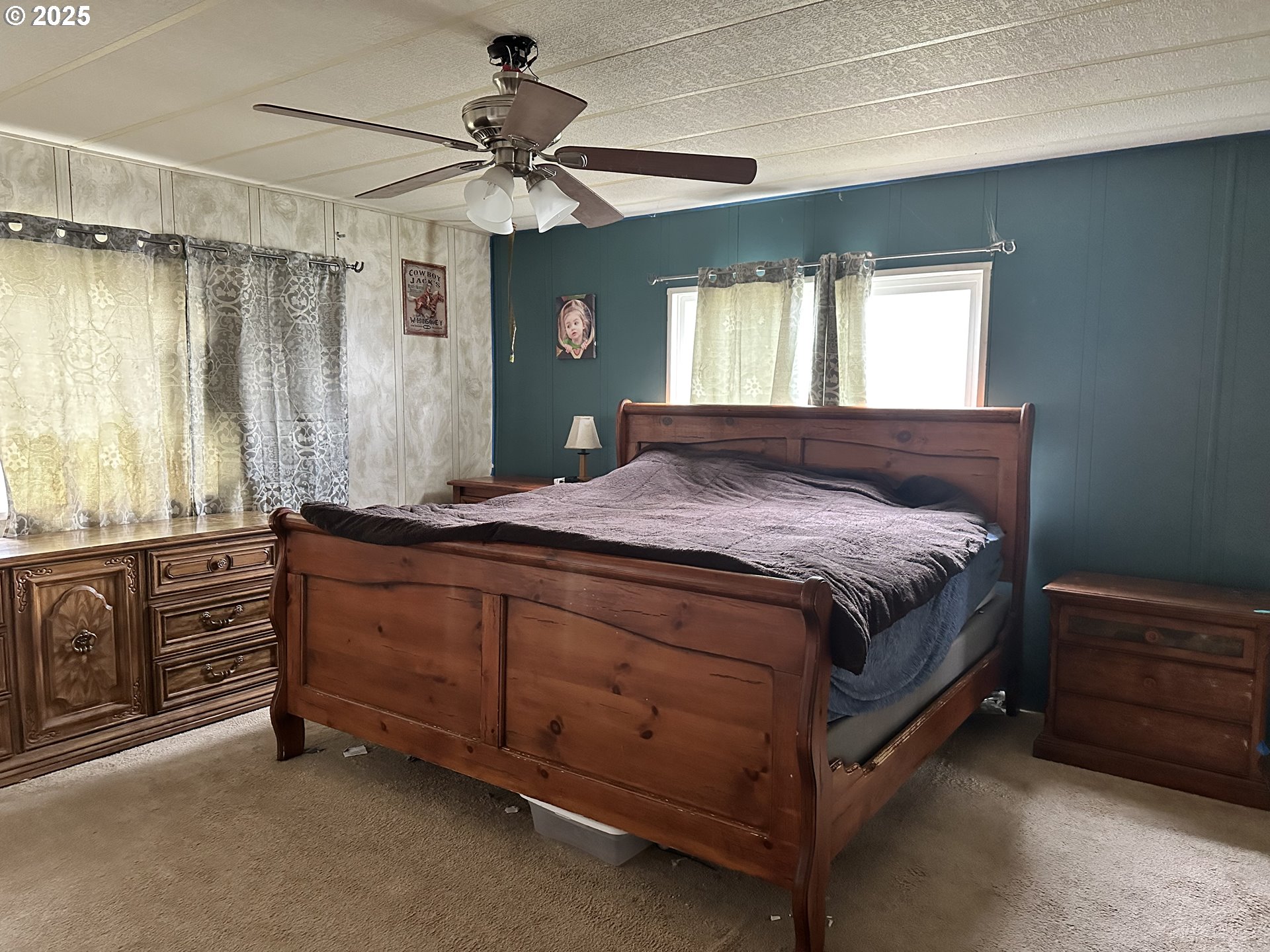 1015 C Street Fossil, OR 97830 - Photo 26 of 33 a bedroom with a bed and a dresser