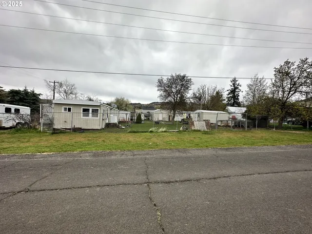 a view of a street with houses