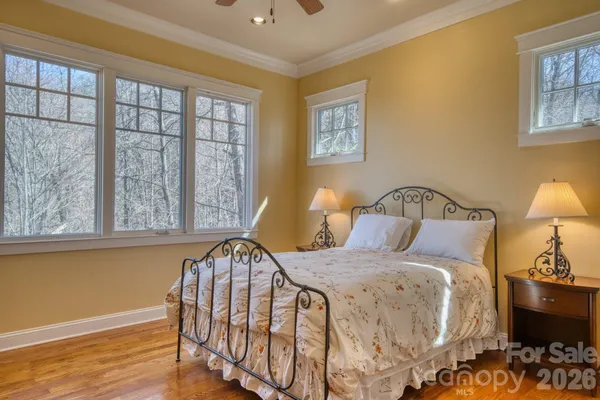 a bathroom with a sink toilet and mirror