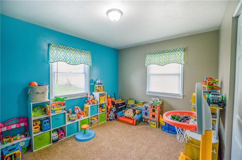 2090 Marshall Road Monaca, PA 15061 - Photo 14 of 24 Talk about versatility! The "family room" is currently being used as a playroom, but could easily work as a 4th bedroom.