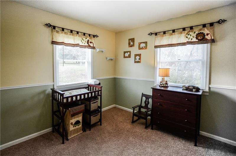 2090 Marshall Road Monaca, PA 15061 - Photo 16 of 24 3rd bedroom features two windows overlooking the flat back yard and decorative molding.