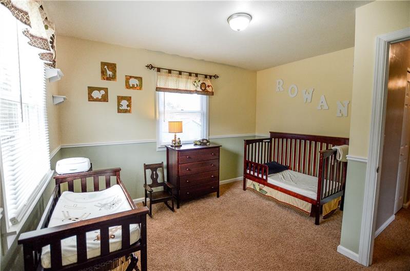 2090 Marshall Road Monaca, PA 15061 - Photo 17 of 24 3rd bedroom features two windows overlooking the flat back yard and decorative molding.