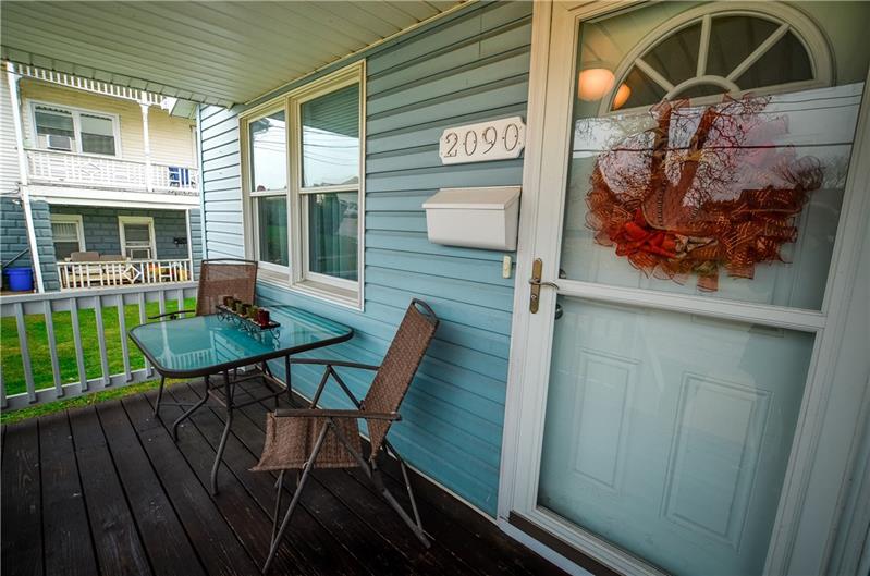 2090 Marshall Road Monaca, PA 15061 - Photo 4 of 24 Enjoy coffee and conversation on the generously-sized covered front porch. There's even room for a grill!