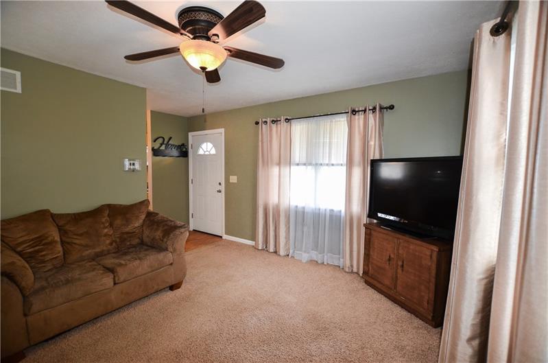 2090 Marshall Road Monaca, PA 15061 - Photo 6 of 24 Large picture window provides fantastic natural lighting in this ample living space.
