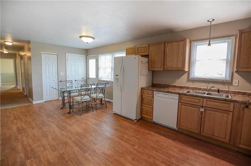 2090 Marshall Road Monaca, PA 15061 - Photo 7 of 24 Imagine the possibilities with this fabulous eat-in kitchen! The open floor plan includes sleek, durable flooring and permits plenty of versatility with table shape and size.