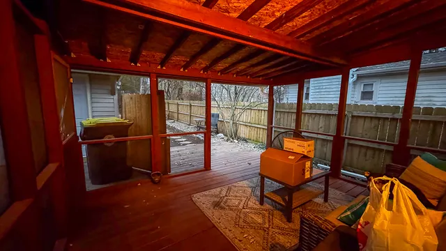 a view of a yard with large trees