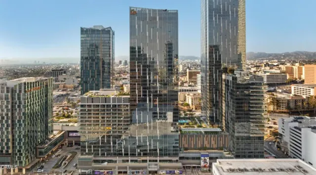 a view of a city with tall buildings