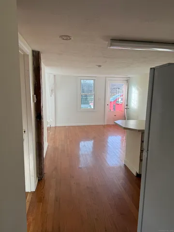 a view of livingroom with furniture and wooden floor