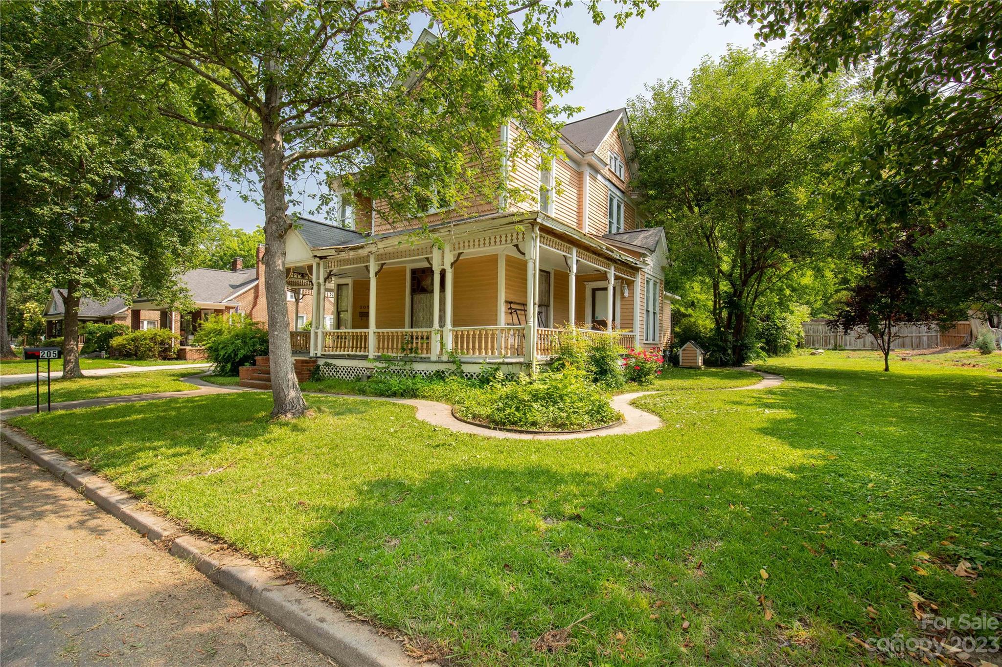 205 Walnut Street Chester, SC 29706 - Photo 1 of 32 a front view of a house with yard and green space