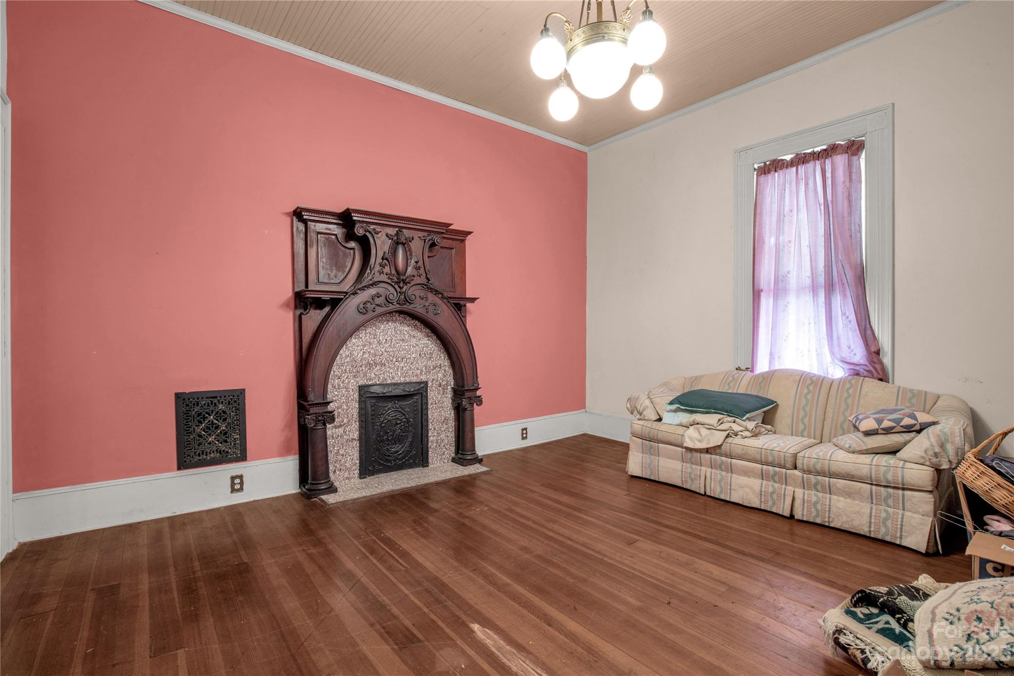 205 Walnut Street Chester, SC 29706 - Photo 15 of 32 a living room with furniture and a fireplace