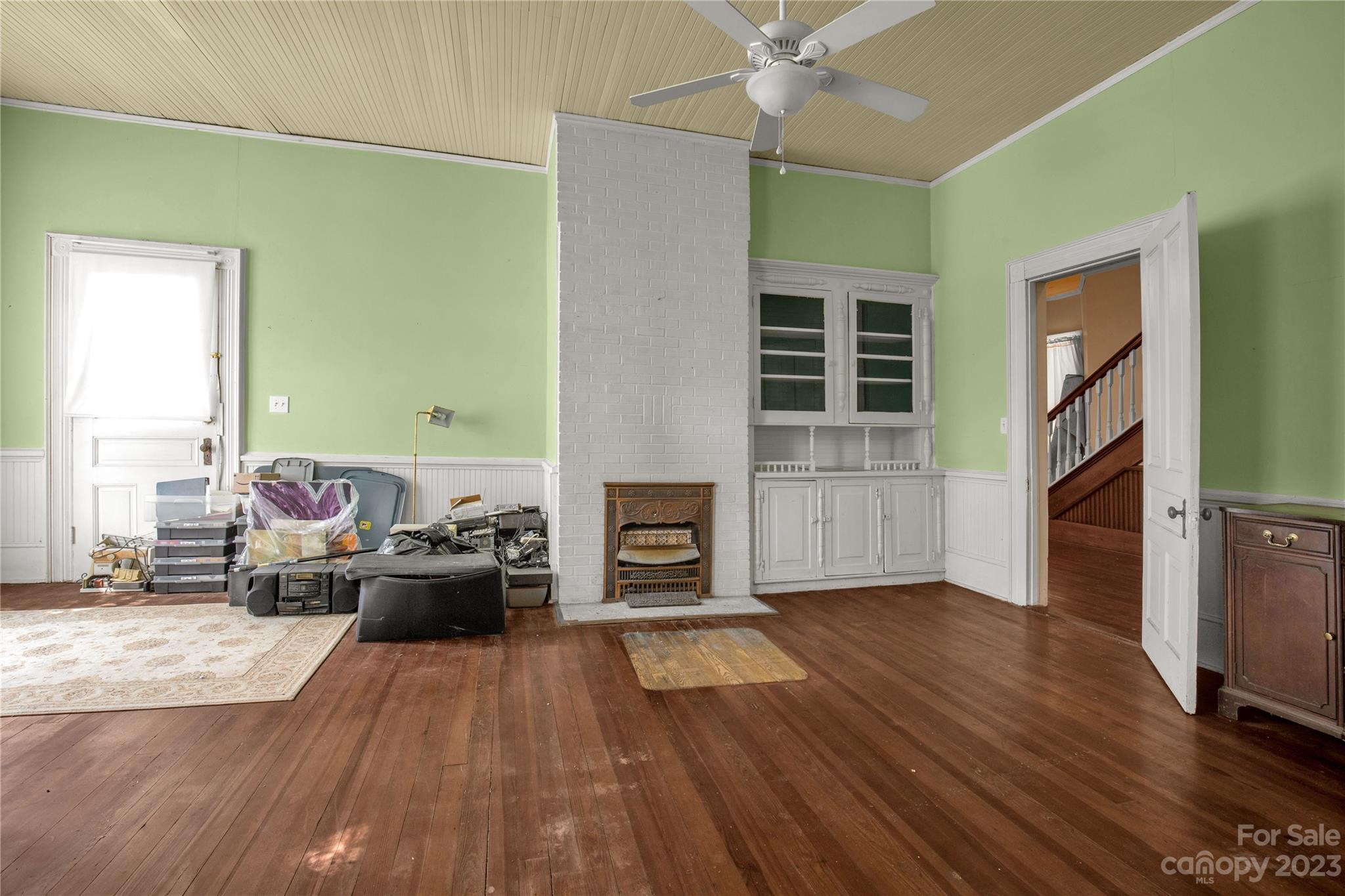 205 Walnut Street Chester, SC 29706 - Photo 17 of 32 a living room with furniture and a fireplace